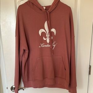 Rust Hoodie with Fleur-de-lis Design